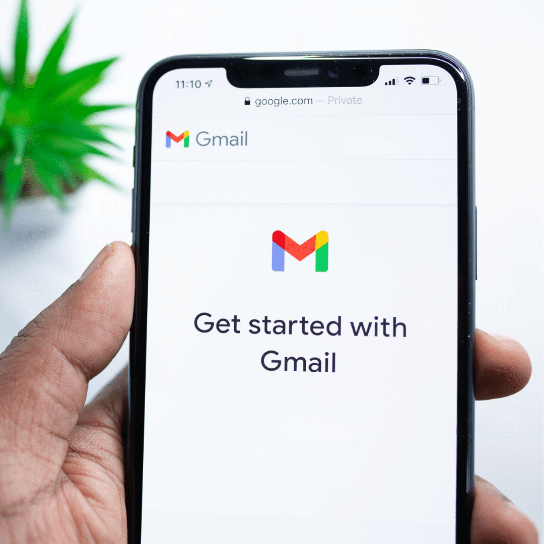 Hand with smartphone Gmail